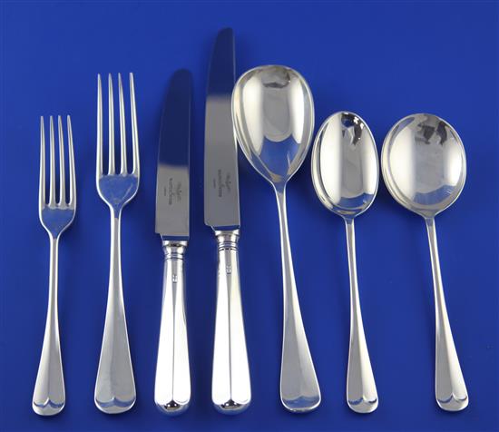 A modern canteen of Mappin & Webb silver Hanovarian rat-tail pattern flatware for eight settings, weighable silver 77.5 oz.